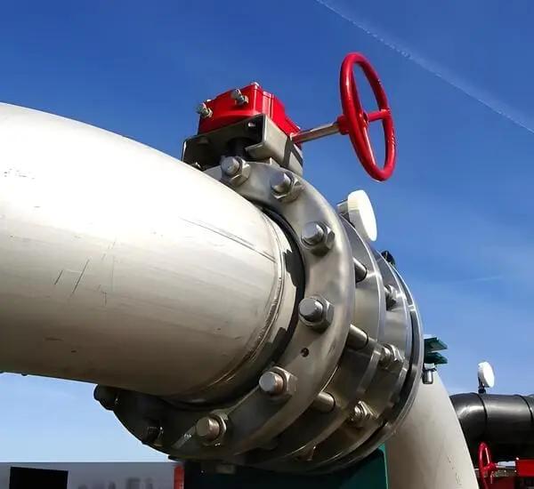 stainless steel blind flanges installed on industrial piping system for high-pressure applications